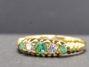 EXQUISITE COLOMBIAN EMERALD AND DIAMOND GYPSY 18 CARAT GOLD RING