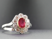  FABULOUS RUBY AND DIAMOND 18 CARAT GOLD AND PLATINUM CLUSTER RING.