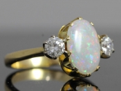 FABULOUS OPAL AND DIAMOND TRILOGY 18 CARAT GOLD RING