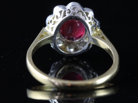 SENSATIONAL RUBY AND DIAMOND CLUSTER 18 CARAT GOLD RING