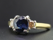  REGAL SAPPHIRE AND DIAMOND TRILOGY 18 CARAT GOLD RING