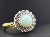 BEAUTIFUL AUSTRALIAIN OPAL AND DIAMOND CLUSTER 18 CARAT GOLD RING