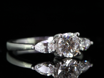 Stunning Platinum Brilliant and Pear Cut Diamond Trilogy Ring