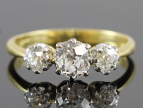  SHOWSTOPPING VINTAGE DIAMOND SET 18 CARAT AND PLATINUM TRILOGY RING