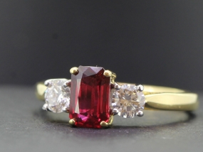 STUNNING RUBY AND DIAMOND 18 CARAT GOLD TRILOGY RING  