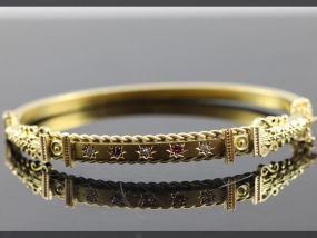 GORGEOUS RUBY AND DIAMOND 15 CARAT GOLD BANGLE