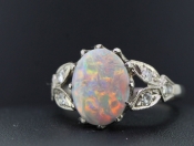 STUNNING OPAL AND DIAMOND PLATINUM RING