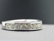 STUNNING DIAMOND HALF ETERNITY 14 CARAT GOLD RING