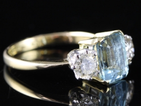 FABULOUS AQUAMARINE AND DIAMOND TRILOGY 18 CARAT GOLD RING