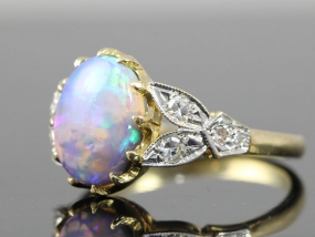 STUNNING BLACK CRYSTAL OPAL AND DIAMOND EDWARDIAN INSPIRED 18 CARAT GOLD RING 