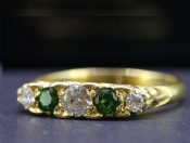  TANTALISING DEMANTOID GARNET AND DIAMOND 18 CARAT GOLD RING