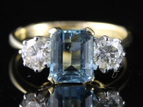 FABULOUS AQUAMARINE AND DIAMOND TRILOGY 18 CARAT GOLD RING