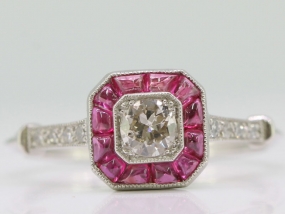 ART DECO INSPIRED DIAMOND AND RUBY PLATINUM TARGET RING