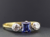 PRETTY SAPPHIRE AND DIAMOND 18 CARAT GOLD RING