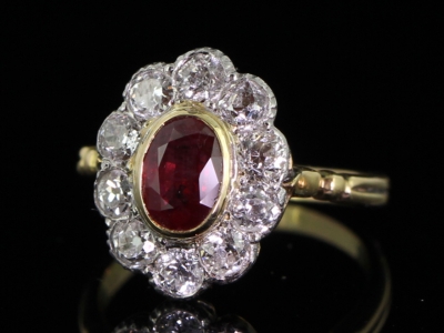  STUNNING RUBY AND DIAMOND 18 CARAT GOLD AND PLATINUM CLUSTER RING