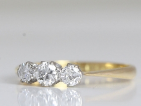 LOVELY DIAMOND TRILOGY 18 CARAT GOLD AND PLATINUM RING