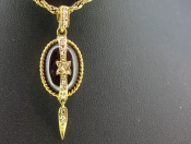 MAGNIFICENT GARNET AND DIAMOND MOURNING PENDANT 