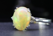  WONDERFUL OPAL AND DIAMOND THREE STONE 18 CARAT GOLD RING