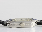 A FINE LADIES PLATINUM, SAPPHIRE AND  DIAMOND BENSON COCKTAIL WATCH