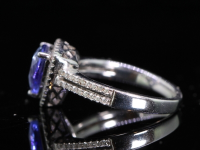 Stunning Trillion Cut Tanzanite and Diamond 18ct Gold Halo Ring