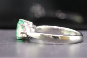 MESMERISING EDWARDIAN EMERALD AND DIAMOND TRILOGY PLATINUM AND 18 CARAT GOLD RING