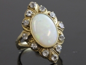 STYLISH REVIVAL INSPIRED TURN OF THE CENTURY 9 CARAT OPAL AND BLUE ZIRCON RING