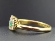 ELEGANT COLOMBIAN EMERALD AND DIAMOND 18 CARAT GOLD RING