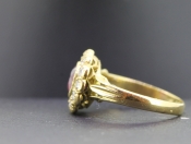 GLAMOROUS RUBY AND DIAMOND 18 CARAT GOLD RING