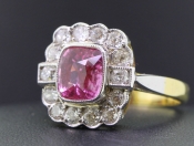 STUNNING PINK SAPPHIRE AND DIAMOND CLUSTER 18 CARAT GOLD RING