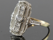 FINE DIAMOND ART DECO PLATINUM AND 18 CARAT GOLD PLAQUE RING