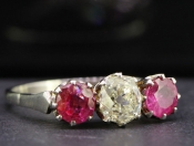 STUNNING BURMESE RUBY AND DIAMOND THREE STONE PLATINUM RING