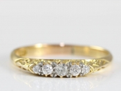 PRETTY EDWARDIAN FIVE STONE DIAMOND 18 CARAT GOLD RING