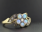 COLOURFUL OPAL AND DIAMOND DAISY 9 CARAT GOLD RING