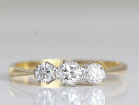 LOVELY DIAMOND TRILOGY 18 CARAT GOLD AND PLATINUM RING