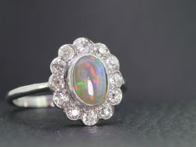 SPELLBINDING BLACK OPAL AND DIAMOND PLATINUM CLUSTER RING