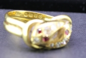 GORGEOUS DOUBLE SNAKE RUBY AND DIAMOND 18 CARAT GOLD RING