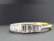 STUNNING SEVEN STONE DIAMOND 18 CARAT GOLD RING