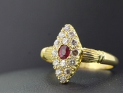 BEAUTIFUL RUBY AND DIAMOND NAVETTE 18 CARAT GOLD RING