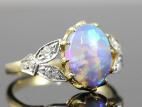 STUNNING BLACK CRYSTAL OPAL AND DIAMOND EDWARDIAN INSPIRED 18 CARAT GOLD RING 