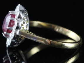 SENSATIONAL RUBY AND DIAMOND CLUSTER 18 CARAT GOLD RING