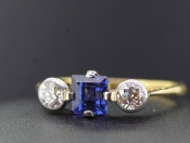 PRETTY SAPPHIRE AND DIAMOND 18 CARAT GOLD RING