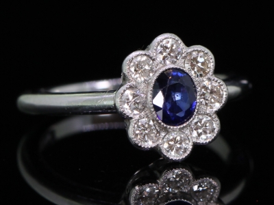 Vintage Sapphire and Diamond Platinum Cluster Ring