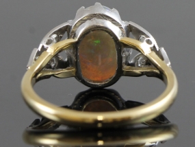 WONDERFUL OPAL AND DIAMOND 18 CARAT GOLD RING