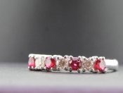 STUNNING RUBY AND DIAMOND 7 STONE 18 CARAT GOLD RING