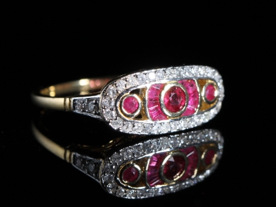 An Estate Ruby and Diamond Art Deco Style 18ct Gold Ring