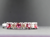 STUNNING RUBY AND DIAMOND 7 STONE 18 CARAT GOLD RING