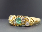 FABULOUS EMERALD AND DIAMOND 18 CARAT GOLD BAND WITH CHESTER HALLMARK
