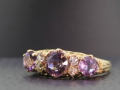 STUNNING AMETHYST AND DIAMOND 9 CARAT GOLD CLUSTER RING 
