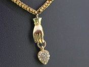 UNIQUE 15 CARAT GOLD HAND AND CHAIN WITH A PEARL AND DIAMOND HEART PENDANT