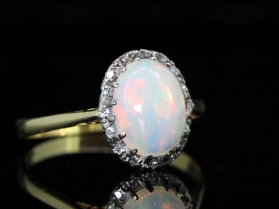 WONDERFUL VINTAGE OPAL AND DIAMOND CLUSTER 18 CARAT GOLD RING